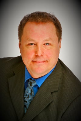 Portrait of Bruce Voigt, REALTOR - RENE - SRS - ABR - CCS.