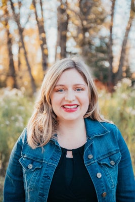 Portrait of Corinne Maher, Associate.