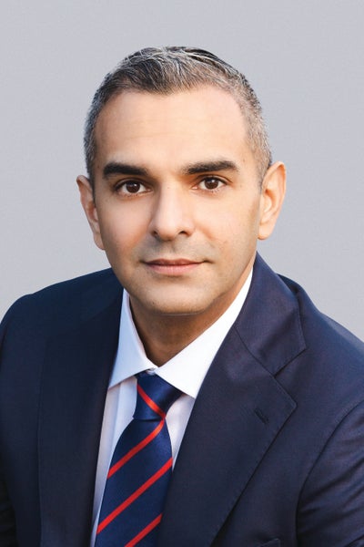 Karl Karanjia, Associate